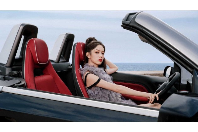 Wuling Hong Guang Mini EV Cabrio Close Up With Woman At The Wheel